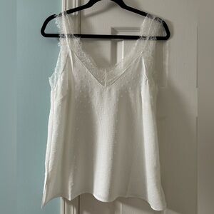 White tank top with lace accents on straps